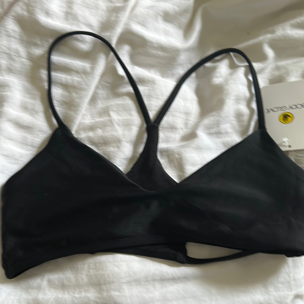 I am selling a black bikini top.